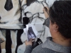 ñ Chelo pintando el mural Educacion